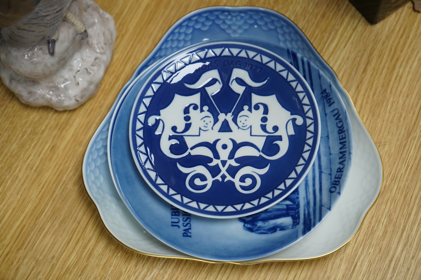 A small collection of Royal Copenhagen plates and a Bing & Grondahl Owl, 29cm high